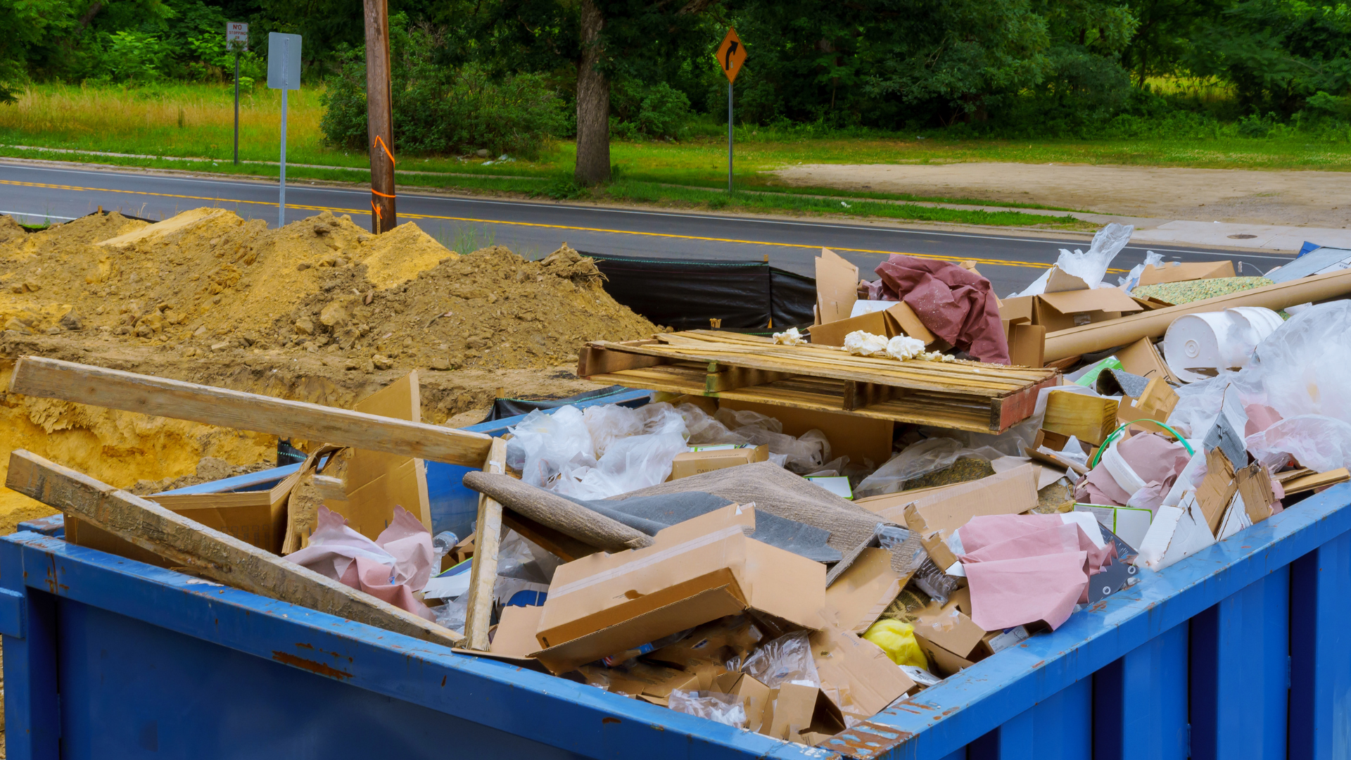 dumpster with trash