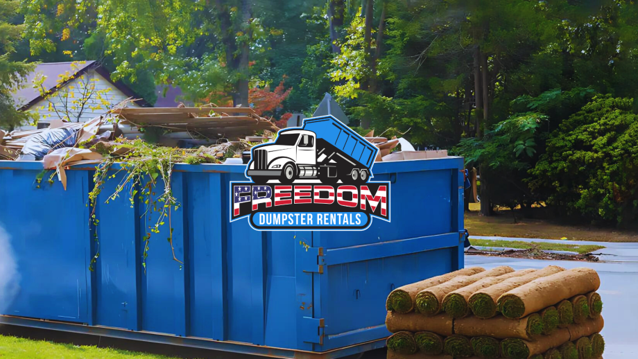 blue roll-off dumpster with sticks and debris inside it.