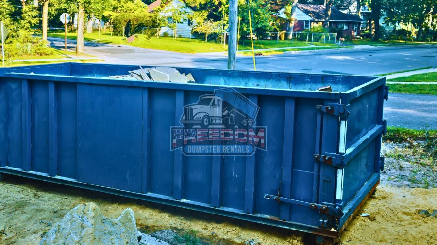 image of dumpster with debris