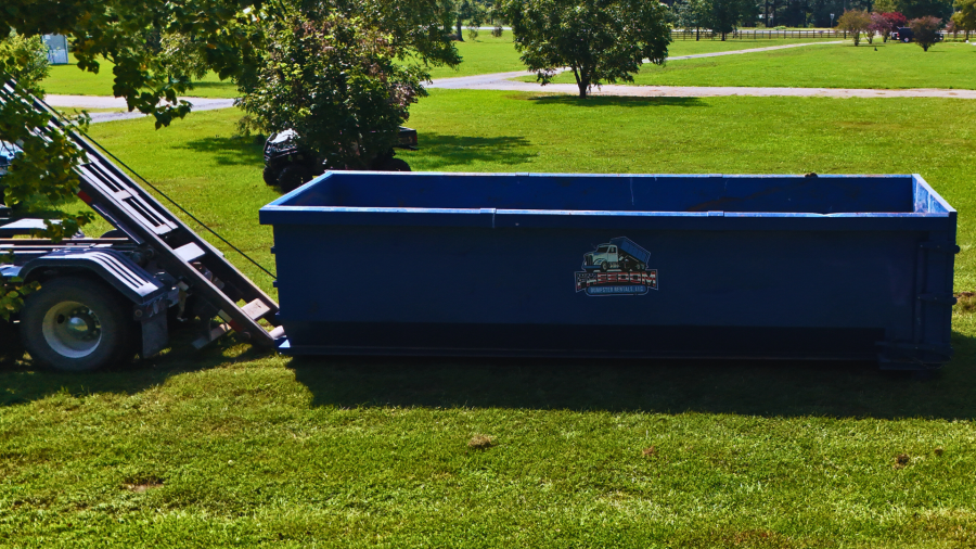 image of dumpster with debris